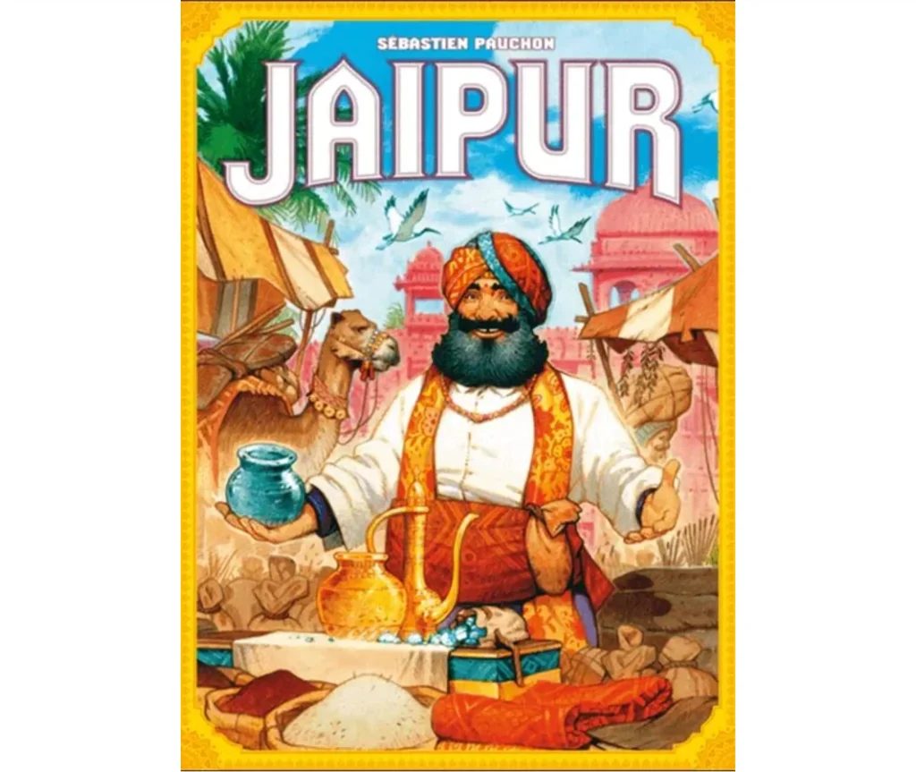 Deux joueurs face à face autour du jeu Jaipur, les cartes colorées étalées sur la table et les jetons de marchandises au centre, dans une ambiance conviviale et orientale.